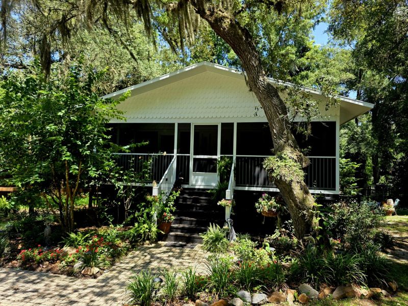 Screen room built by Better Home Improvement on a raised deck in Green Cove Springs, FL